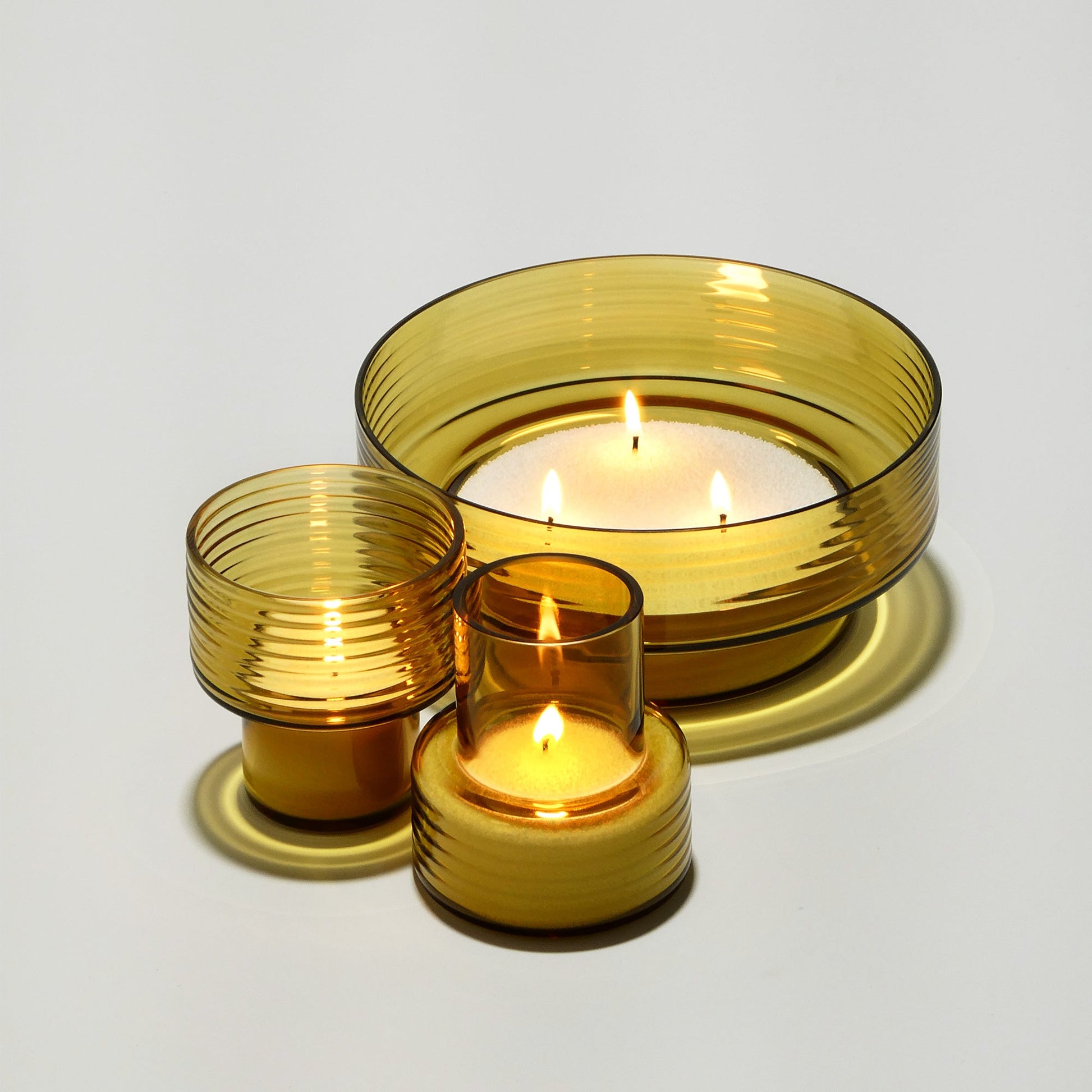 Conjunto 3 castiçais GLOW TOGETHER em vidro soprado — cor mostarda