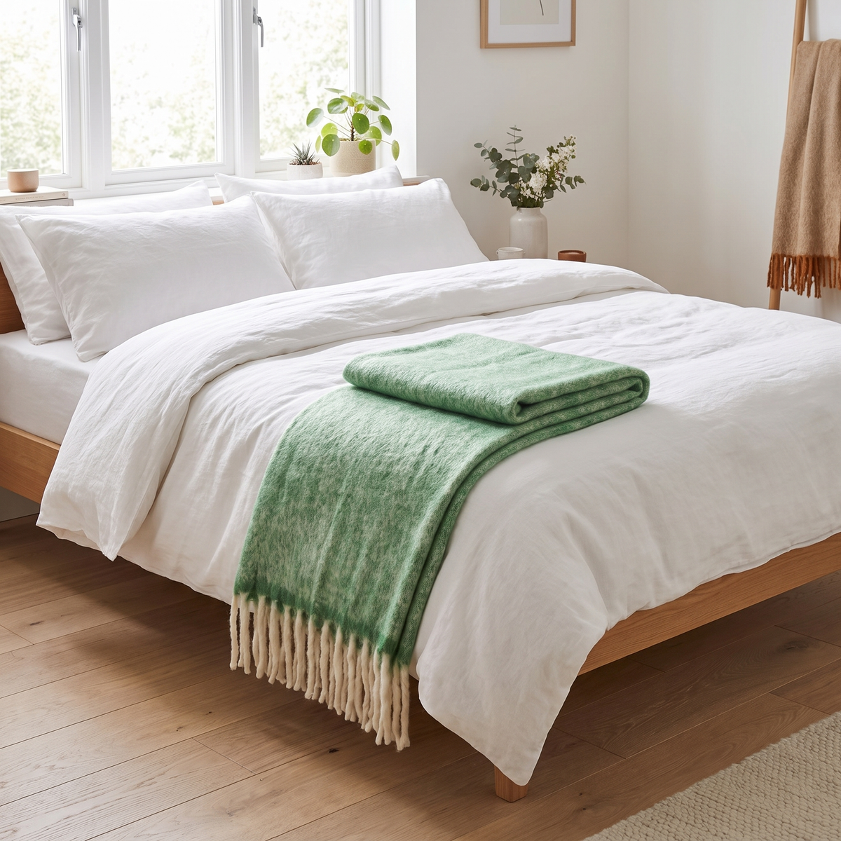 Manta Carmel verde aos pés de uma cama — ambiente
